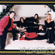 Illustration for article titled Vintage Kardashian Holiday Cards: Old Noses, Awkward Poses